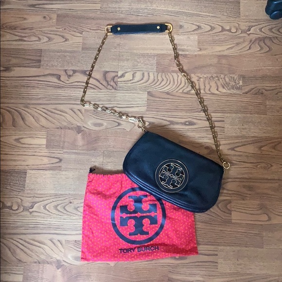 Tory Burch Handbags - TORY BURCH Black and gold logo crossbody clutch